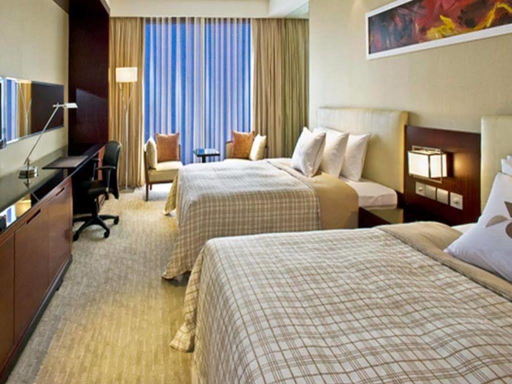 Sheraton Grand Hangzhou Binjiang Hotel Exterior foto